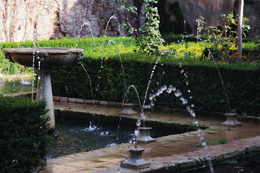 home landscape with water feature